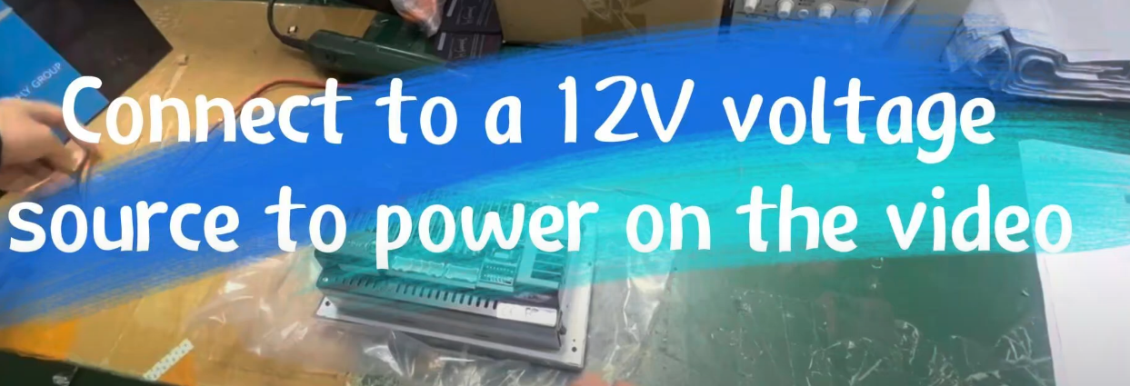 Connect to a 12V voltage source to power on the video
